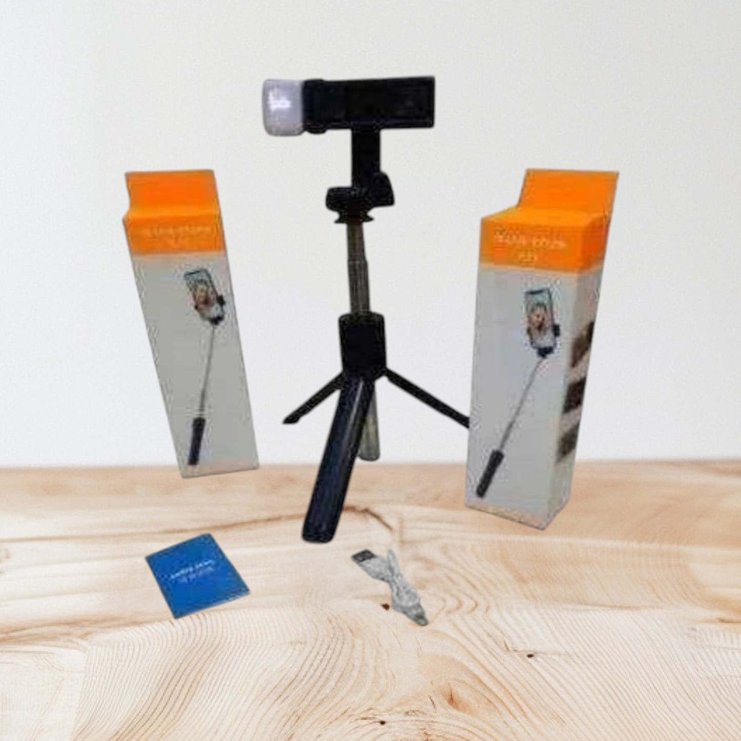 R1s Bluetooth Selfie Stick with a built-in tripod stand and an LED fill light. It is a 3-in-1