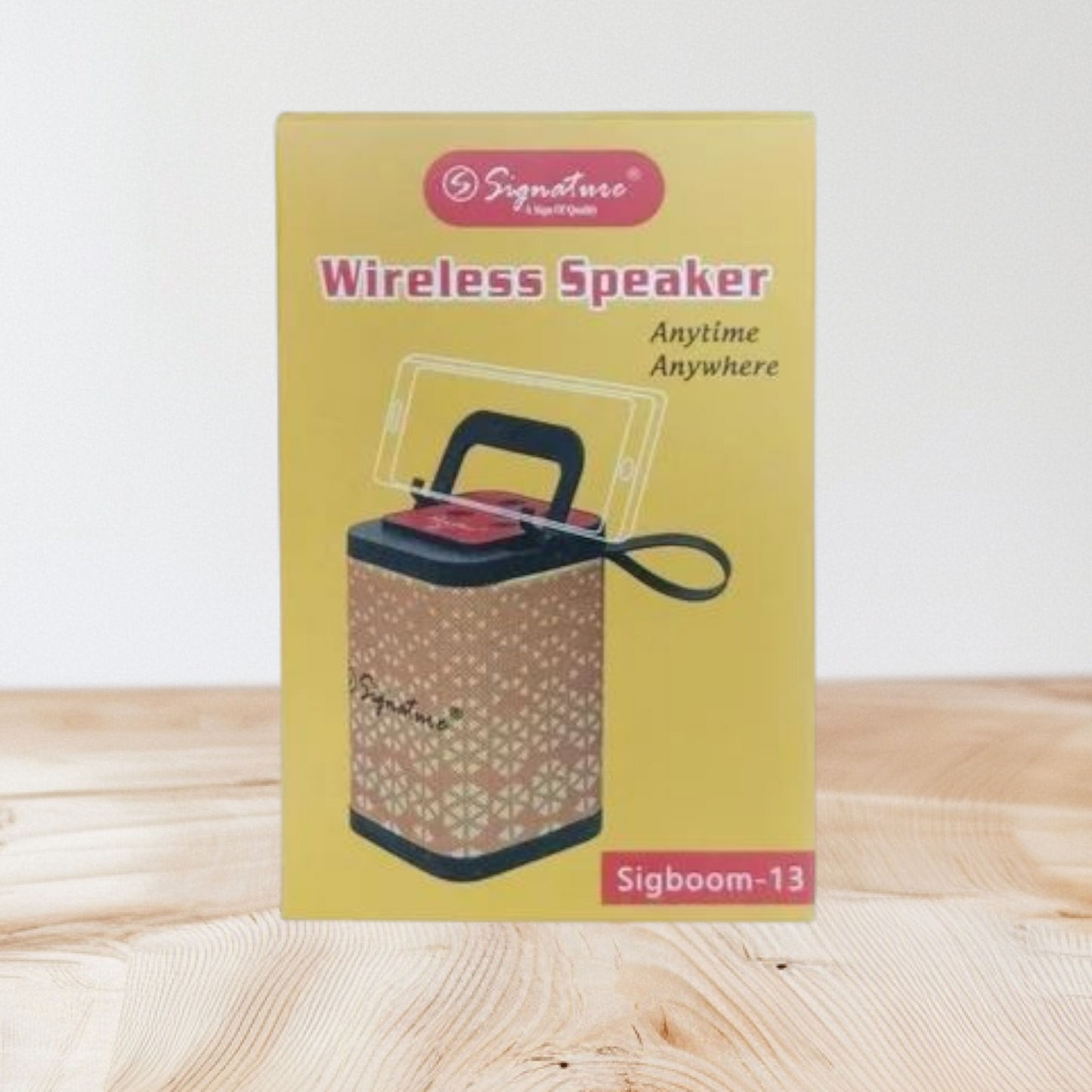 Signature brand wireless speaker, specifically the SIGBOOM-13 model.